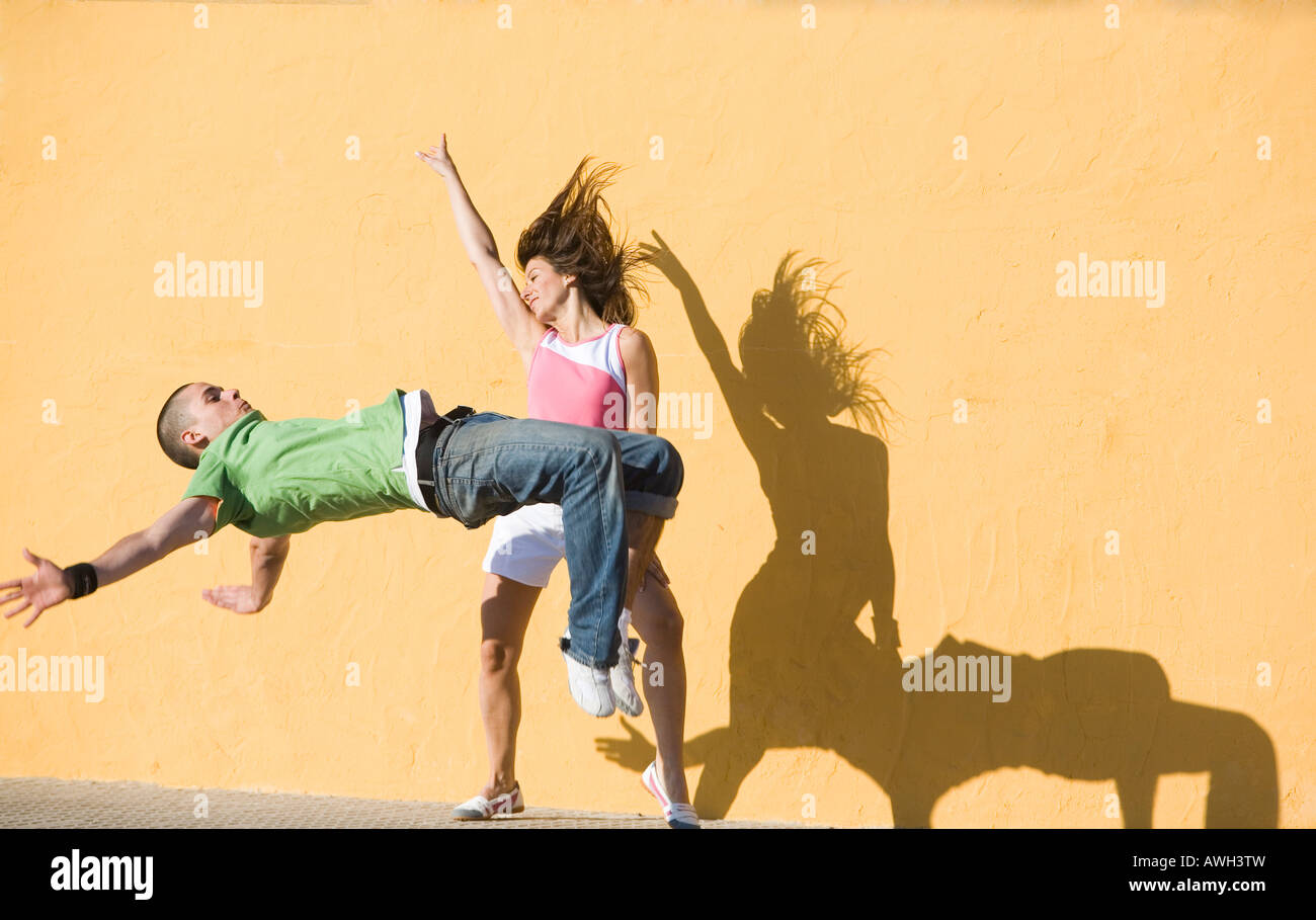 Young couple having fun street dancing Stock Photo