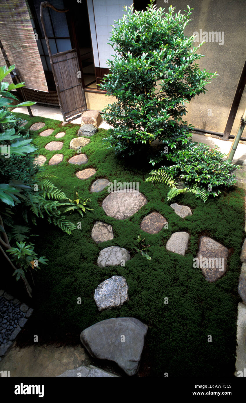 Stepping stones leading to a Teahouse in the Zen garden of Zuiho in Temple Kyoto Japan Stock Photo