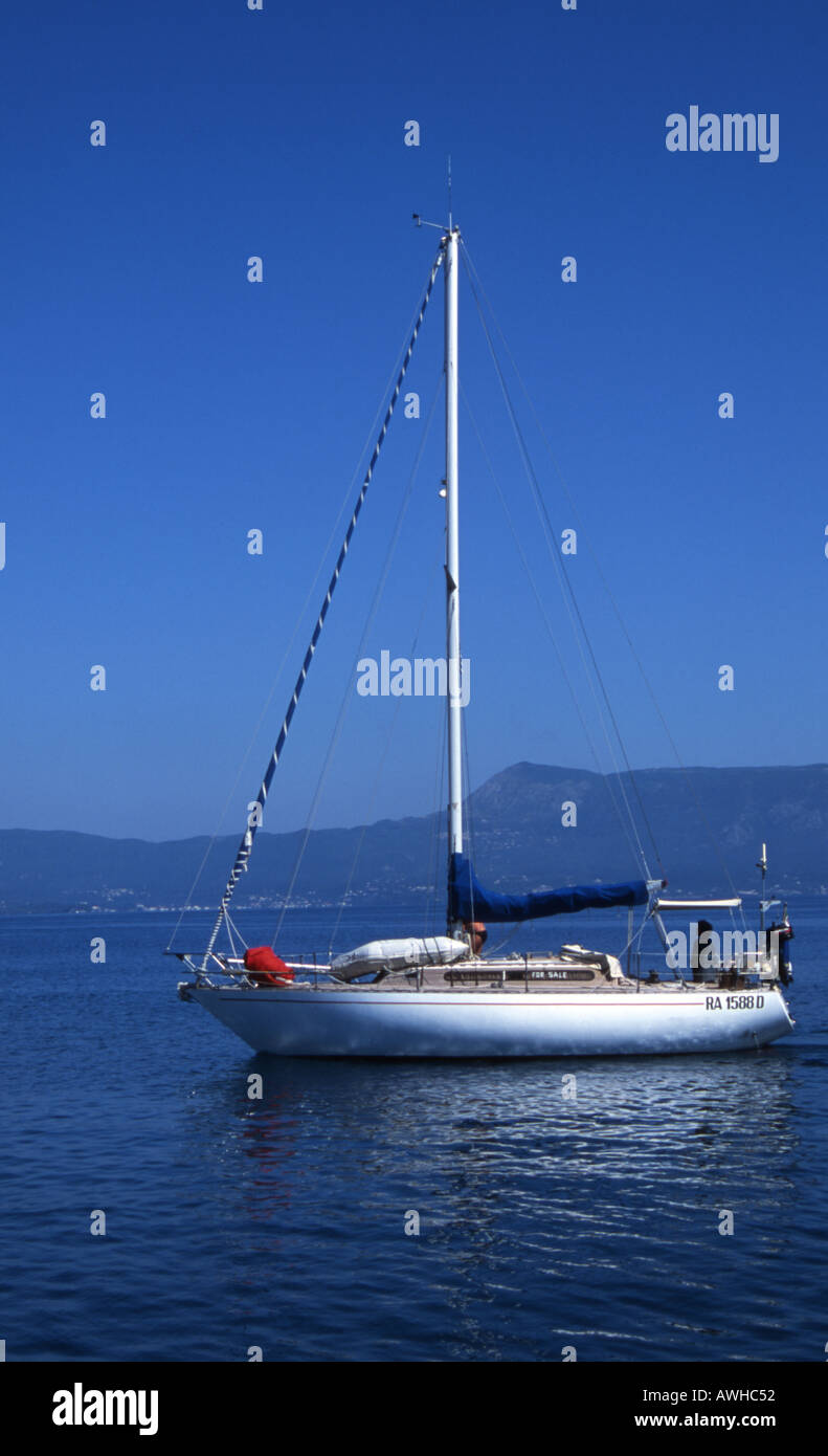 WHITE YACHT BLUE SEA. CORFU GREEK ISLAND Stock Photo