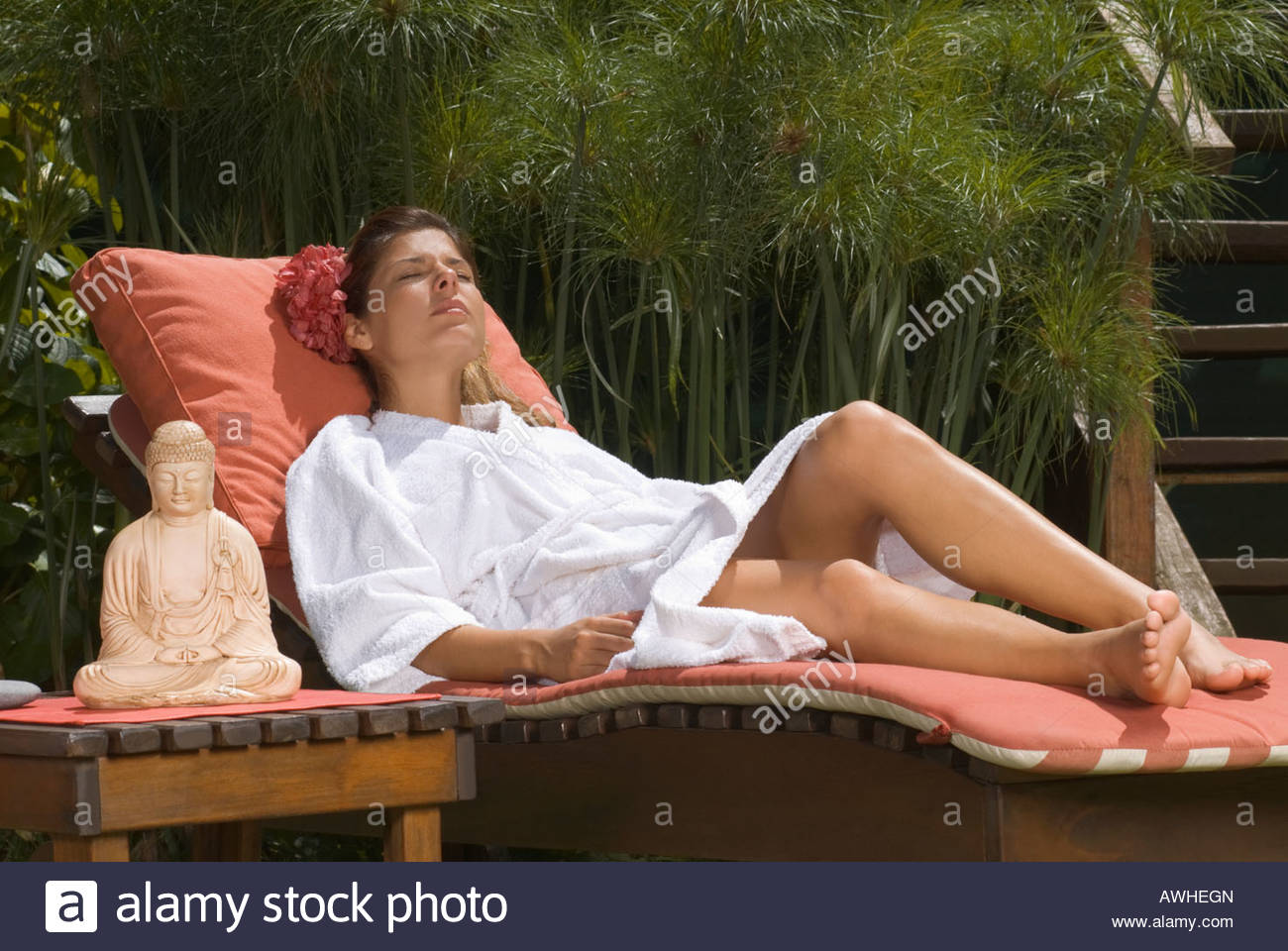 Woman Sleeping In Lounge Chair Stock Photos & Woman Sleeping In Lounge