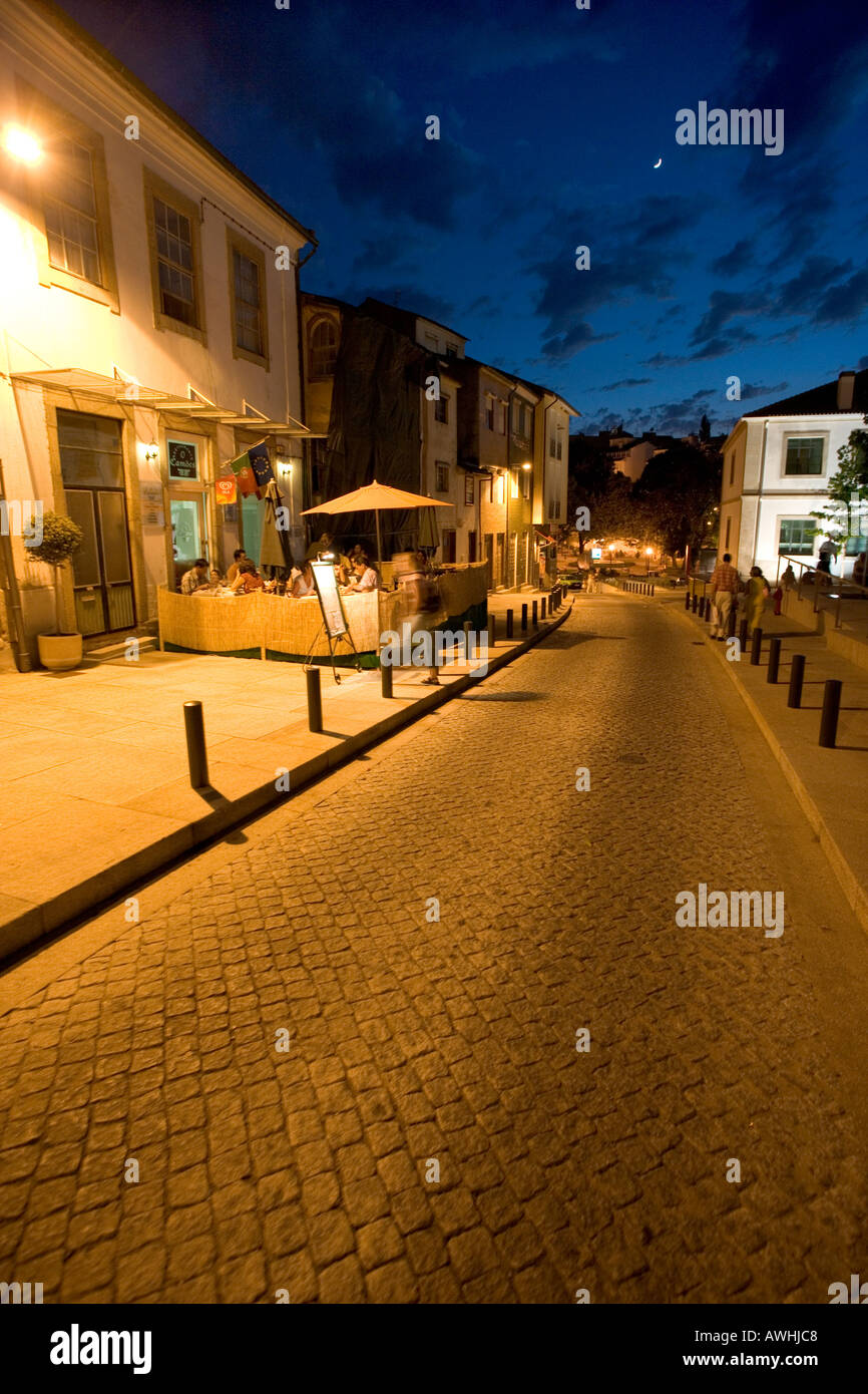 A restaurant with outdoor tables in the center of the fortified city of Bragança in Portugal. Stock Photo