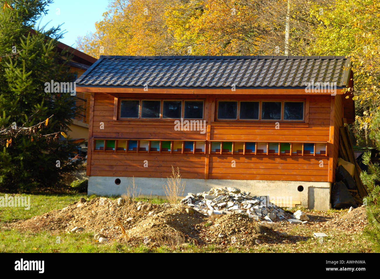 A Swiss bee house, housing 20 hives in one shed Stock Photo