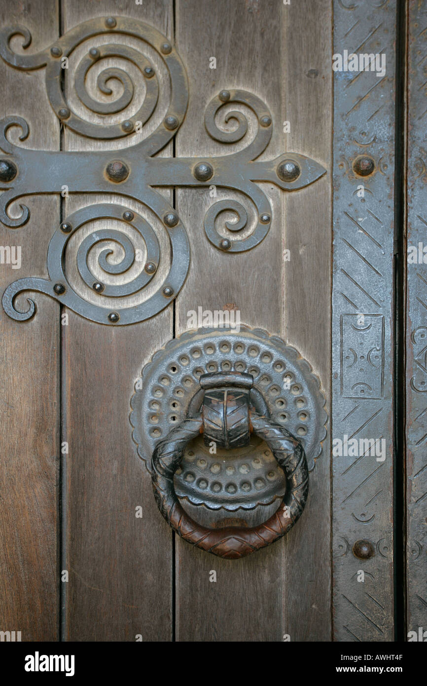 The door handles hinges and trim on the main front door of the