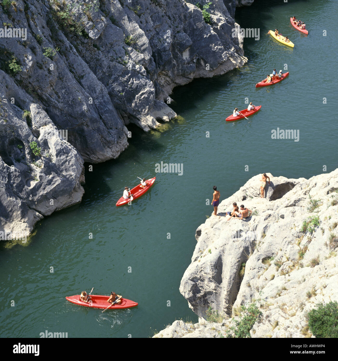 Aerial view summer canoeing French rocky Herault river gorge spectators on  rocks above near Saint Guilhem le Désert Hérault Occitanie South of France  Stock Photo - Alamy