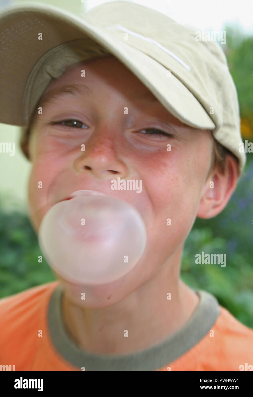 Boy blowing bubble gum hires stock photography and images Alamy
