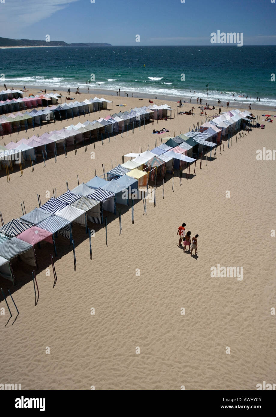 A birds eye view seasonal cabanas on the wide beaches at the coastal resort town of Nazaré on Portugal s Atlantic seaboard Stock Photo