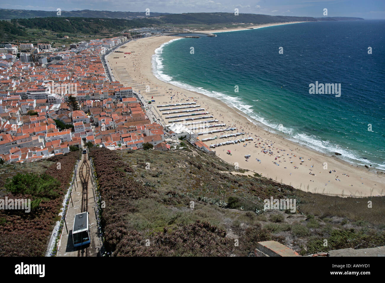 A bird's eye view of the wide beaches at the coastal resort town of Nazaré on Portugal's Atlantic seaboard. Stock Photo