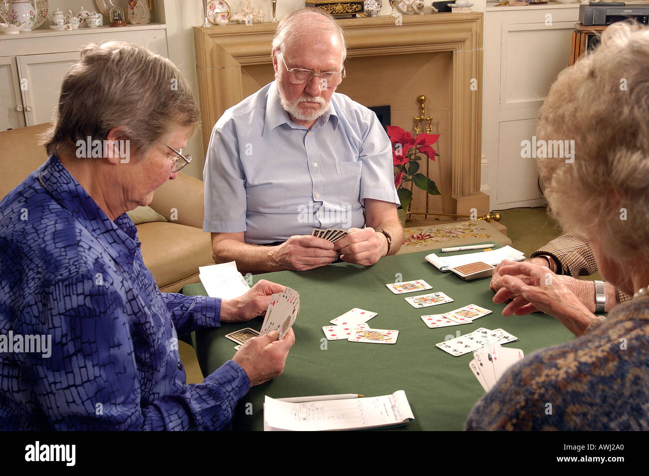 elderly-people-playing-a-game-of-bridge-AWJ2A0.jpg