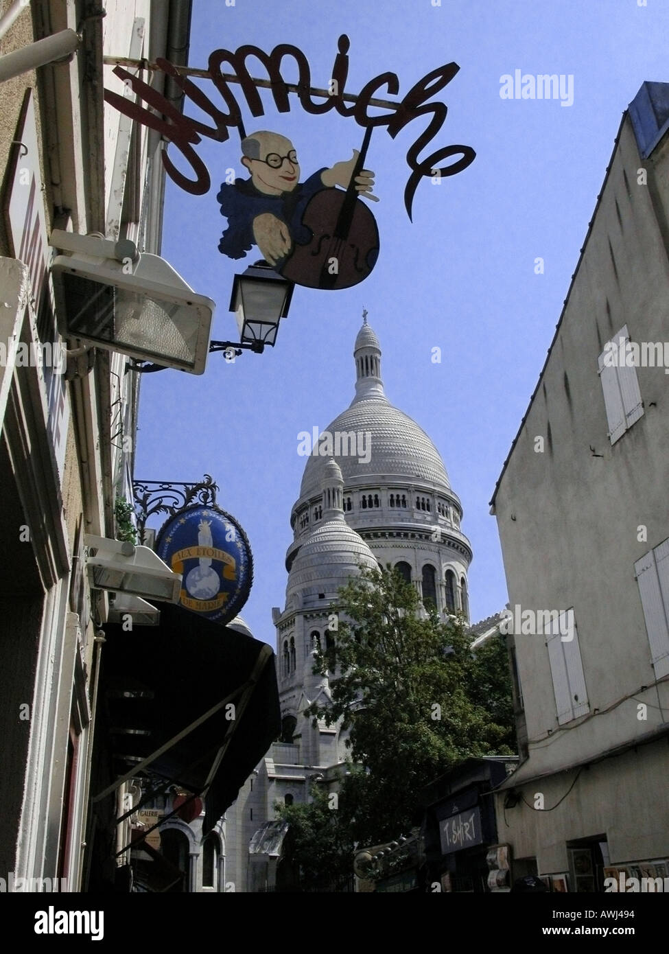 france ile de france paris montmartre shop sign mimiche and view of cupola of Sacre Coeur Stock Photo