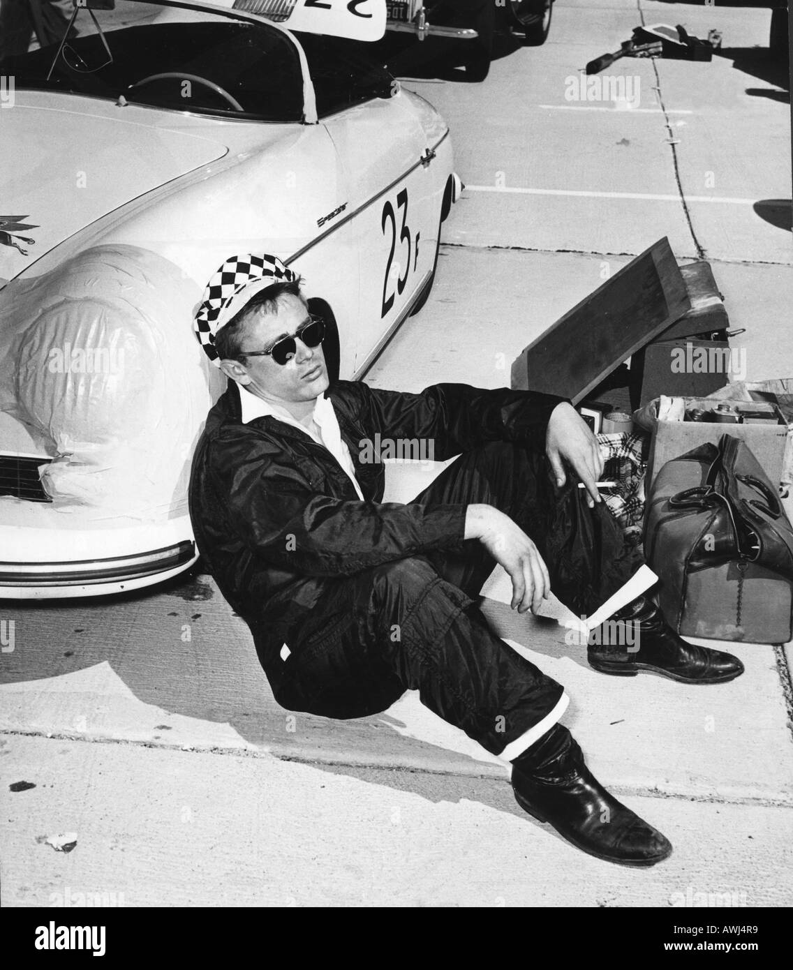 JAMES DEAN with his Porsche 550 Spyder Speedster at a California car rally about 1954 he was killed driving this car a year late Stock Photo