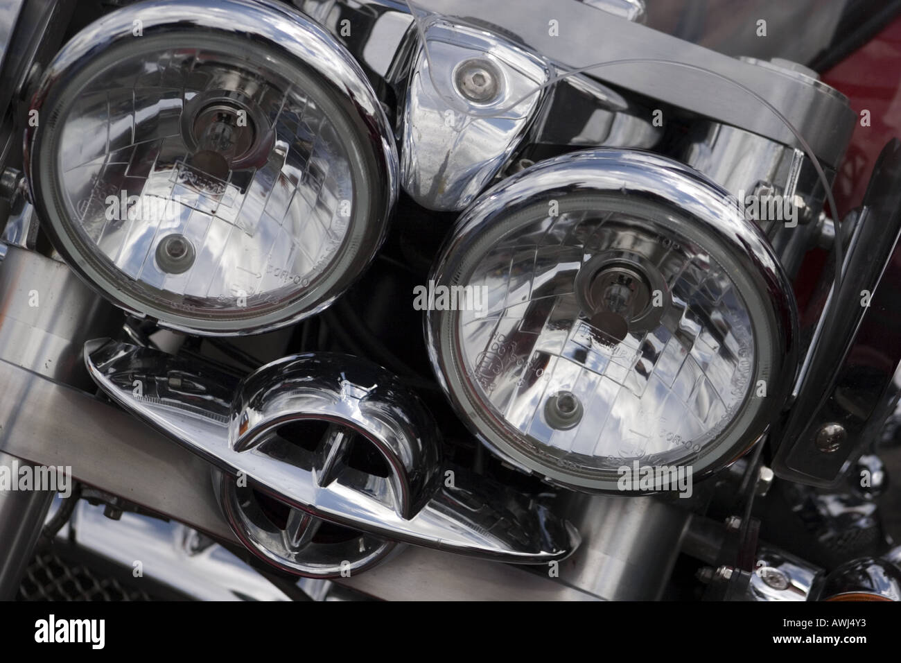 Triumph Motor Bike Headlight Detail triumph motor bike detail head light  detail front twin 2 two reflect bulb shine chrome gloss Stock Photo - Alamy