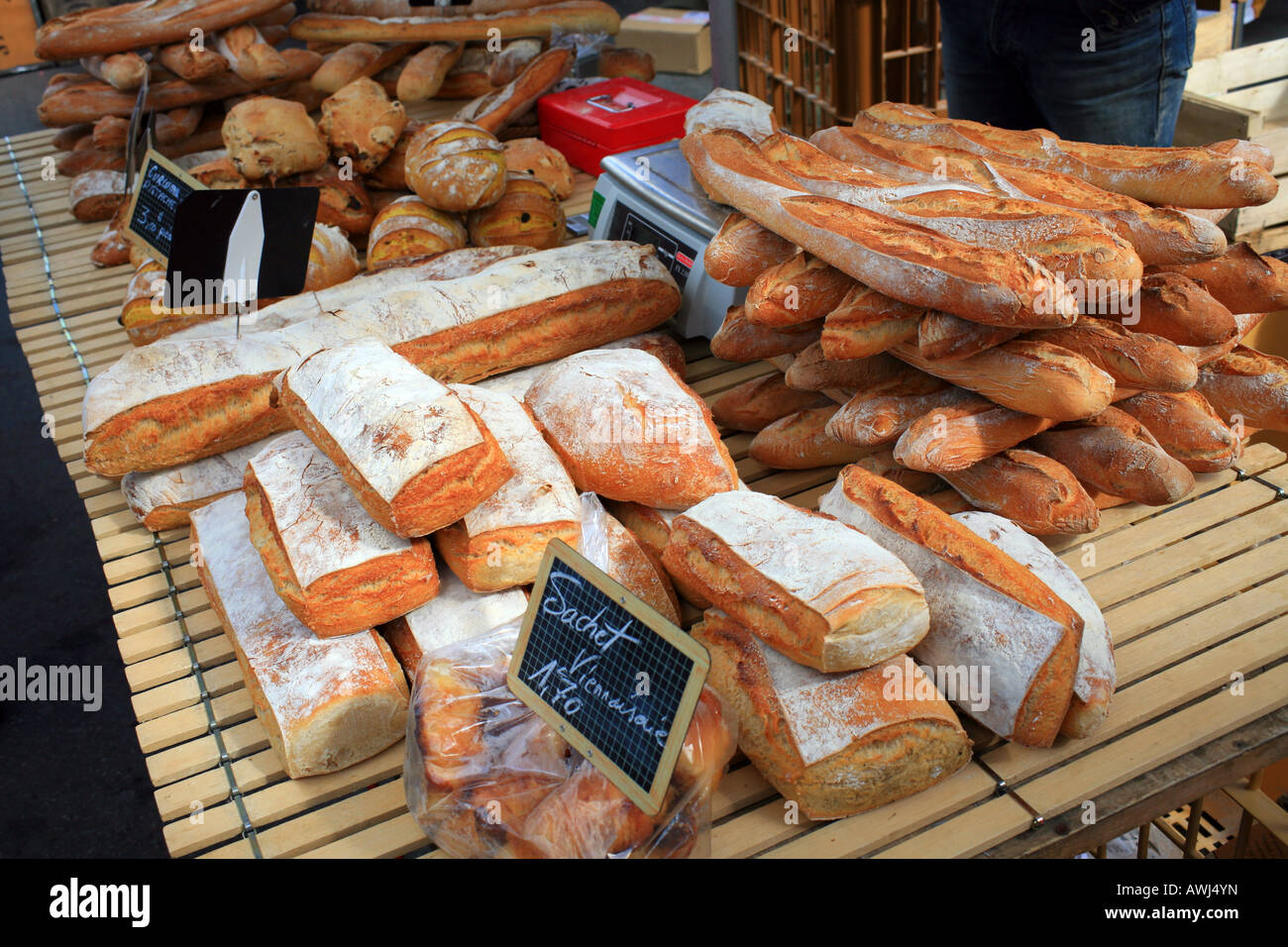 French bread on a market stall in Place Duguesclin, Dinan, Cotes d