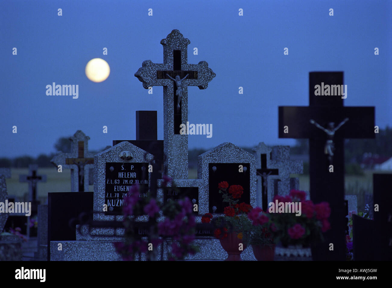 Gravestones on a graveyard at night, Drobin, Poland Stock Photo Alamy