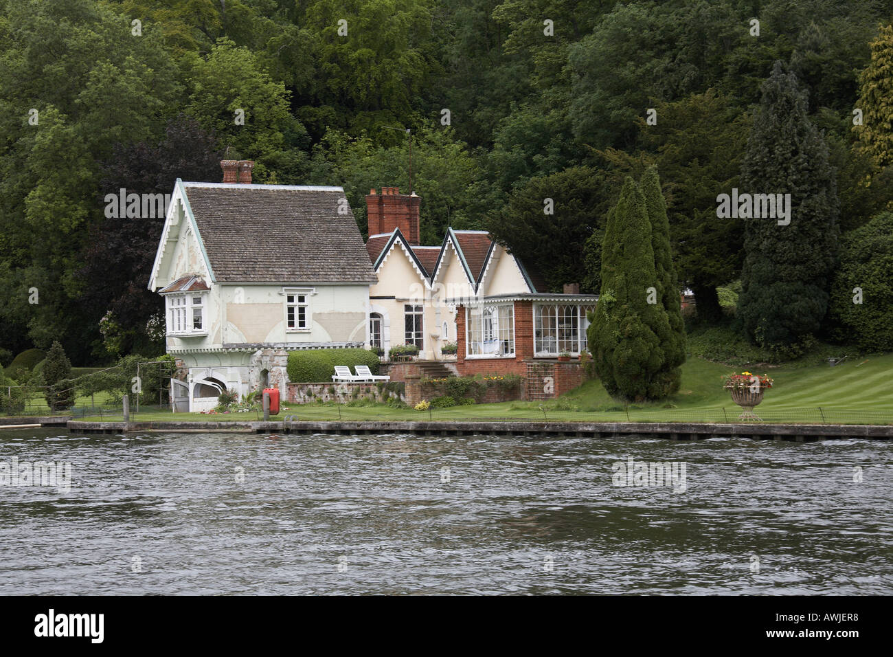 Beautiful traditional riverside residential house or home with boat house near Henley on Thames