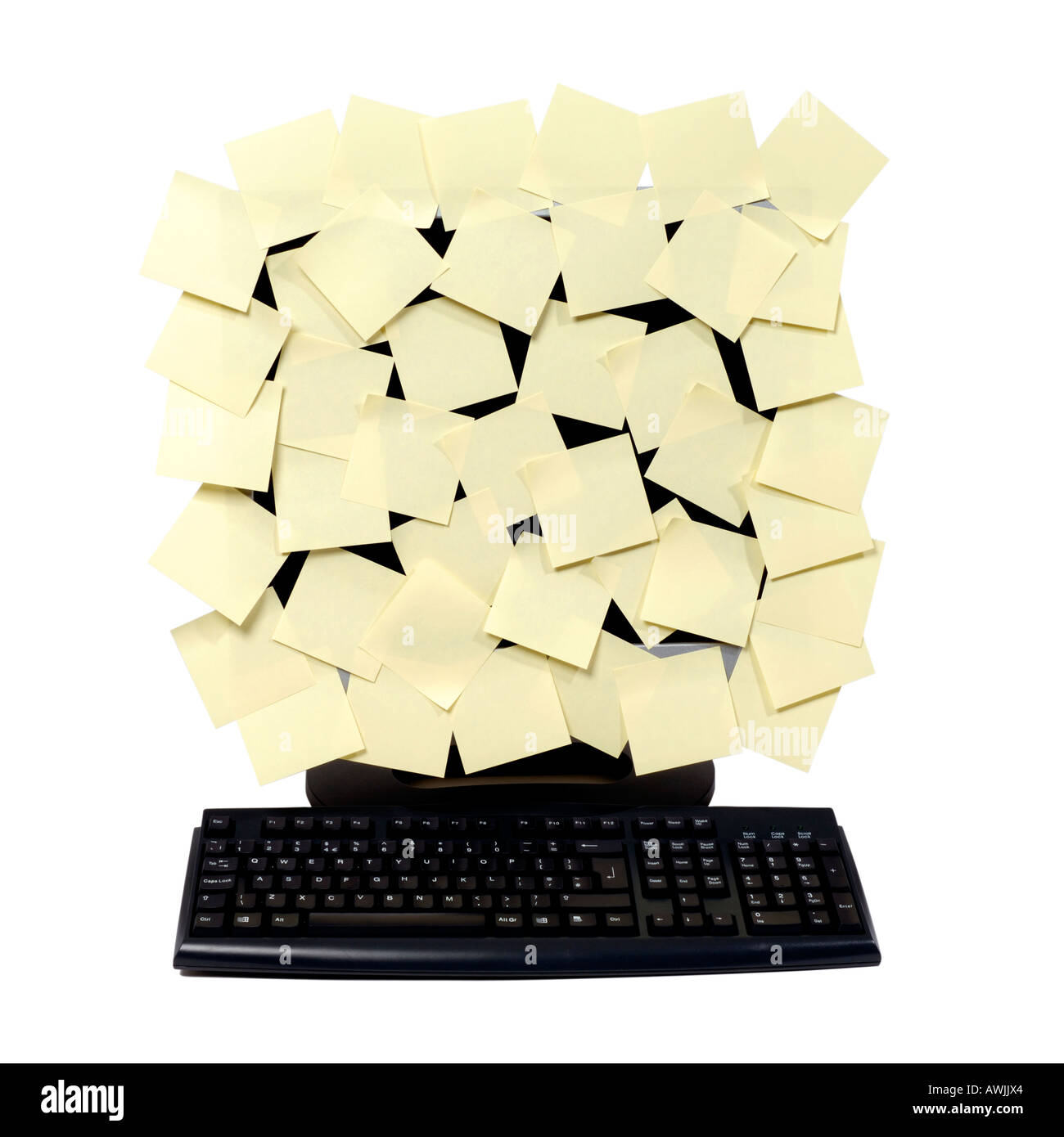 Computer screen covered in yellow post it notes Stock Photo
