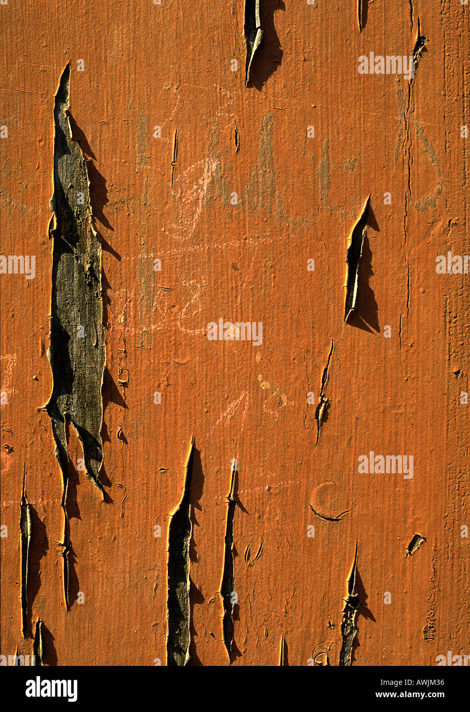 Orange paint peeling off wood Stock Photo Alamy