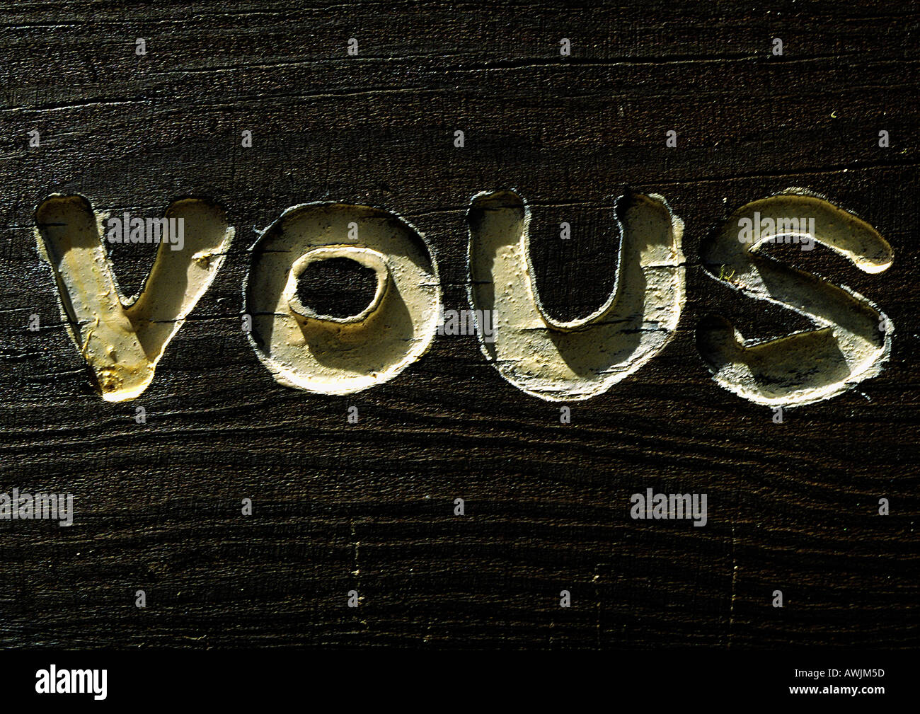 You typography in French engraved in wood Stock Photo Alamy