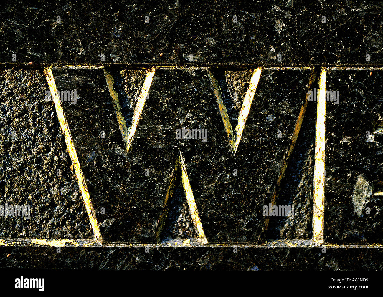 W, text, carved. Stock Photo