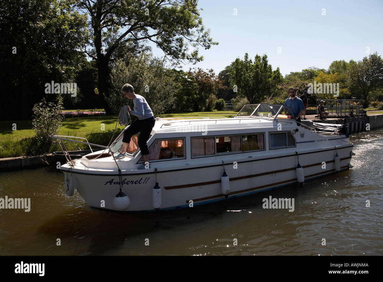 Mapledurham Lock with cabin cruiser motor yacht pleasure boat near Purley on Thames on River Thames Stock Photo