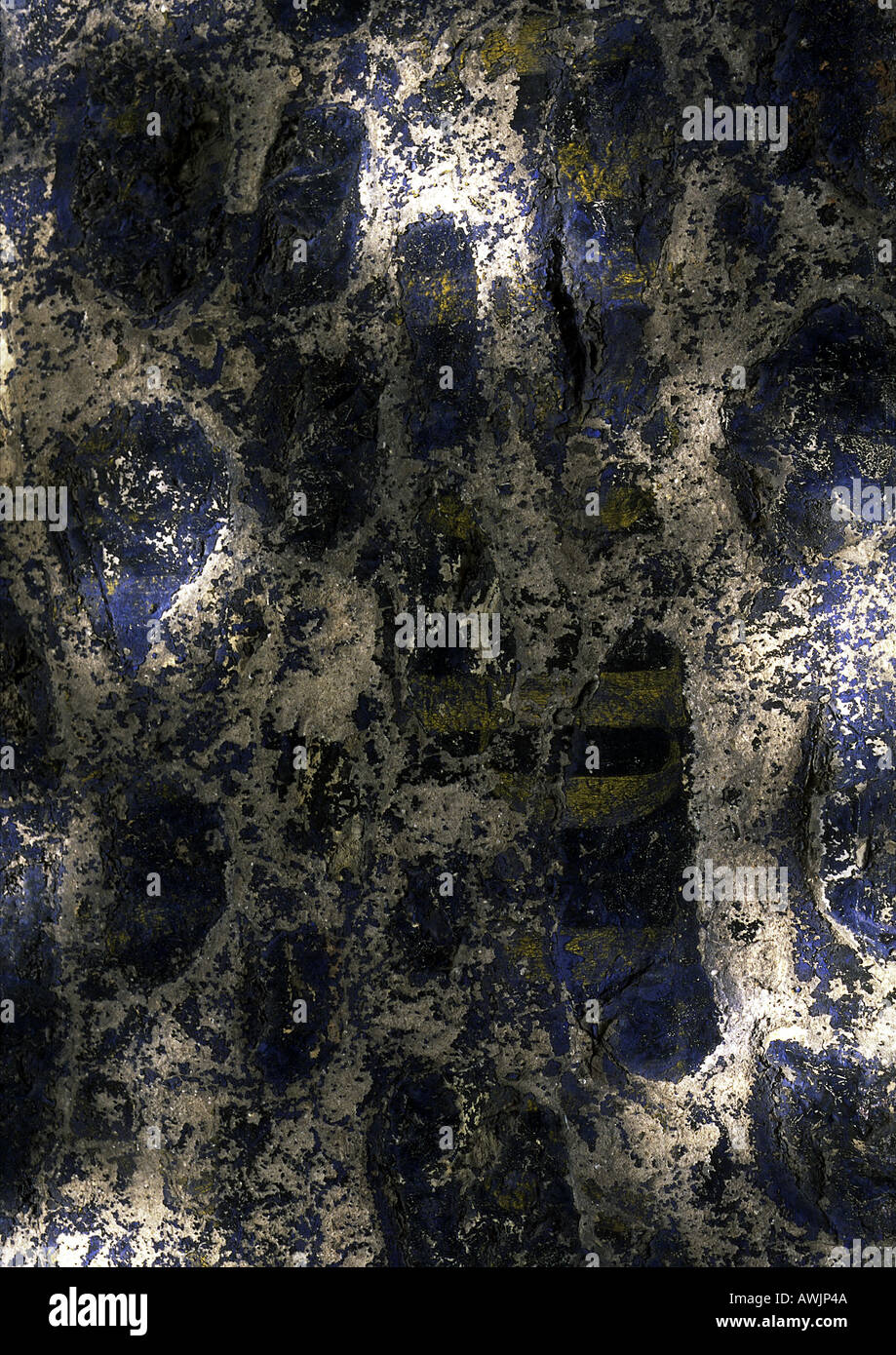 Worn blue paint on white surface, close-up Stock Photo