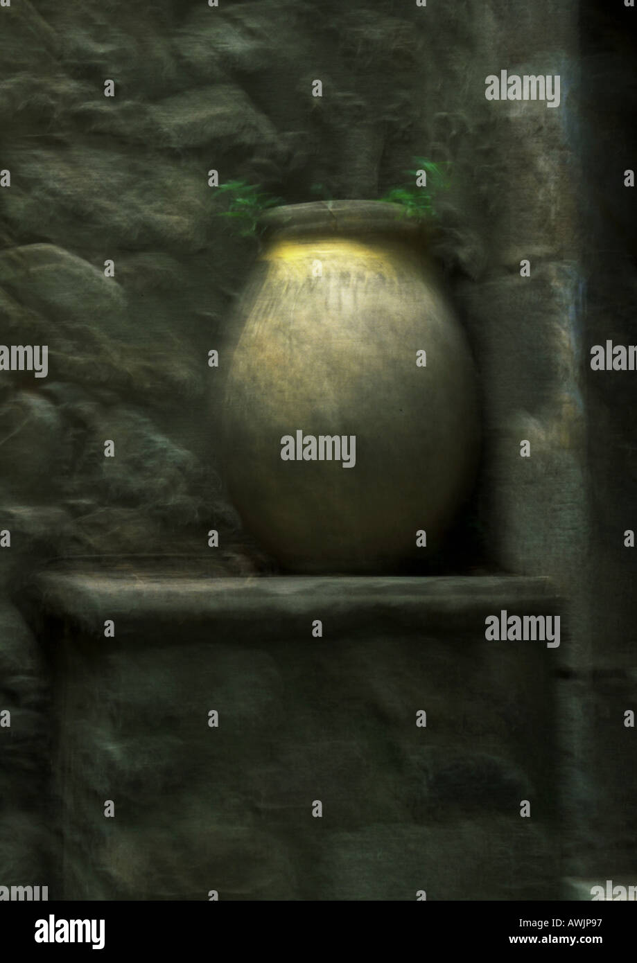 Yellow pot in corner, blurry. Stock Photo