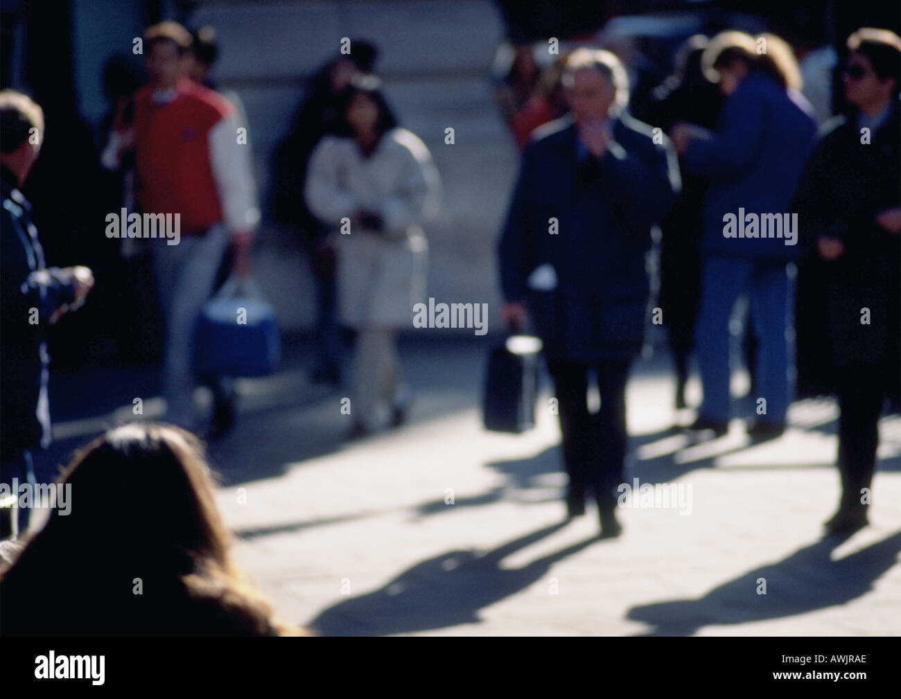 Unrecognizable people walking on streets hi-res stock photography and ...
