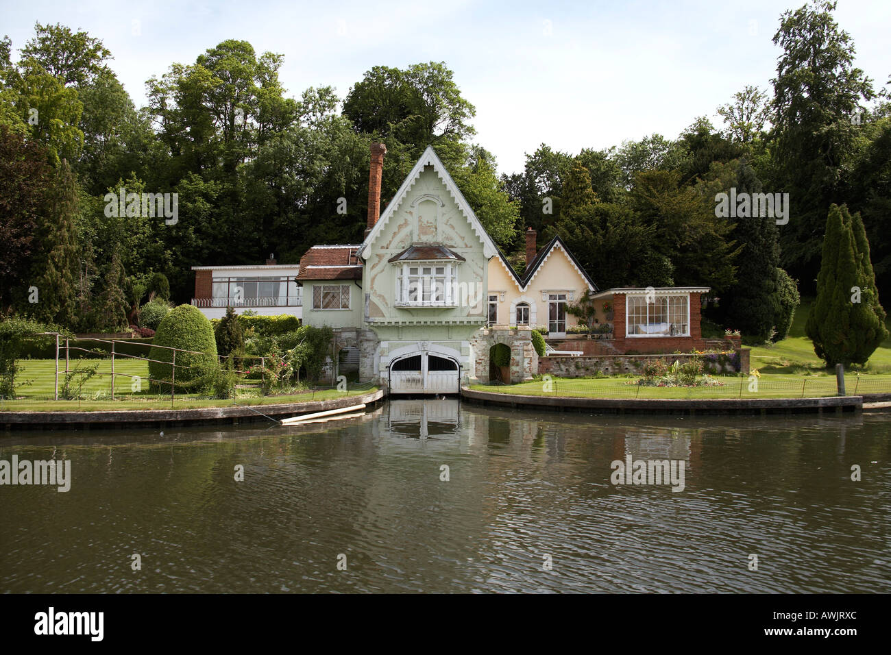 Grand beautiful luxury expensive residential house or home with boat house beside river near