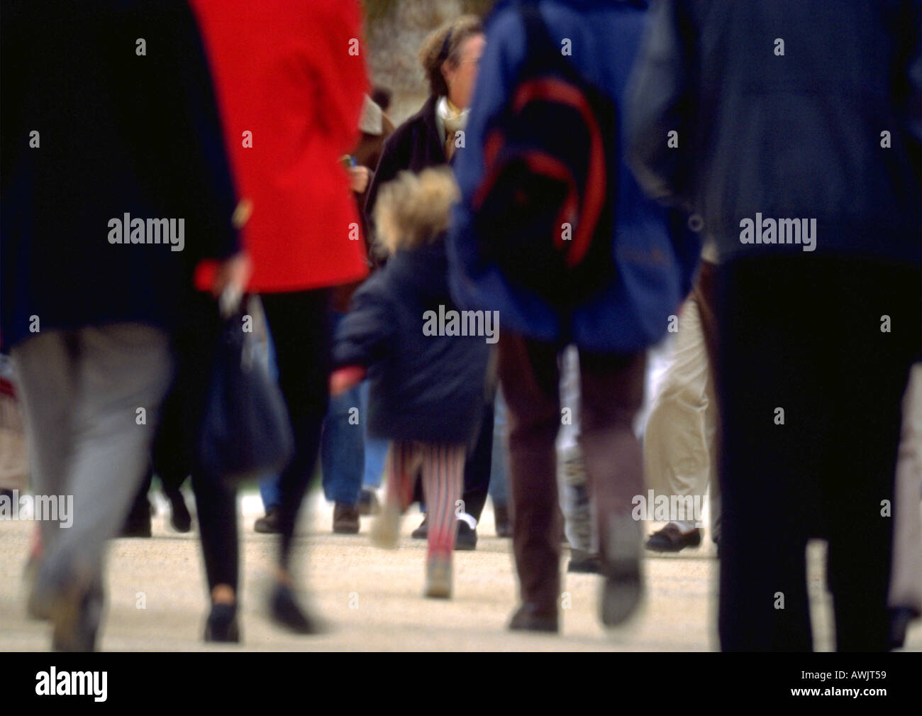 Crowd walking, lower section, blurred motion Stock Photo