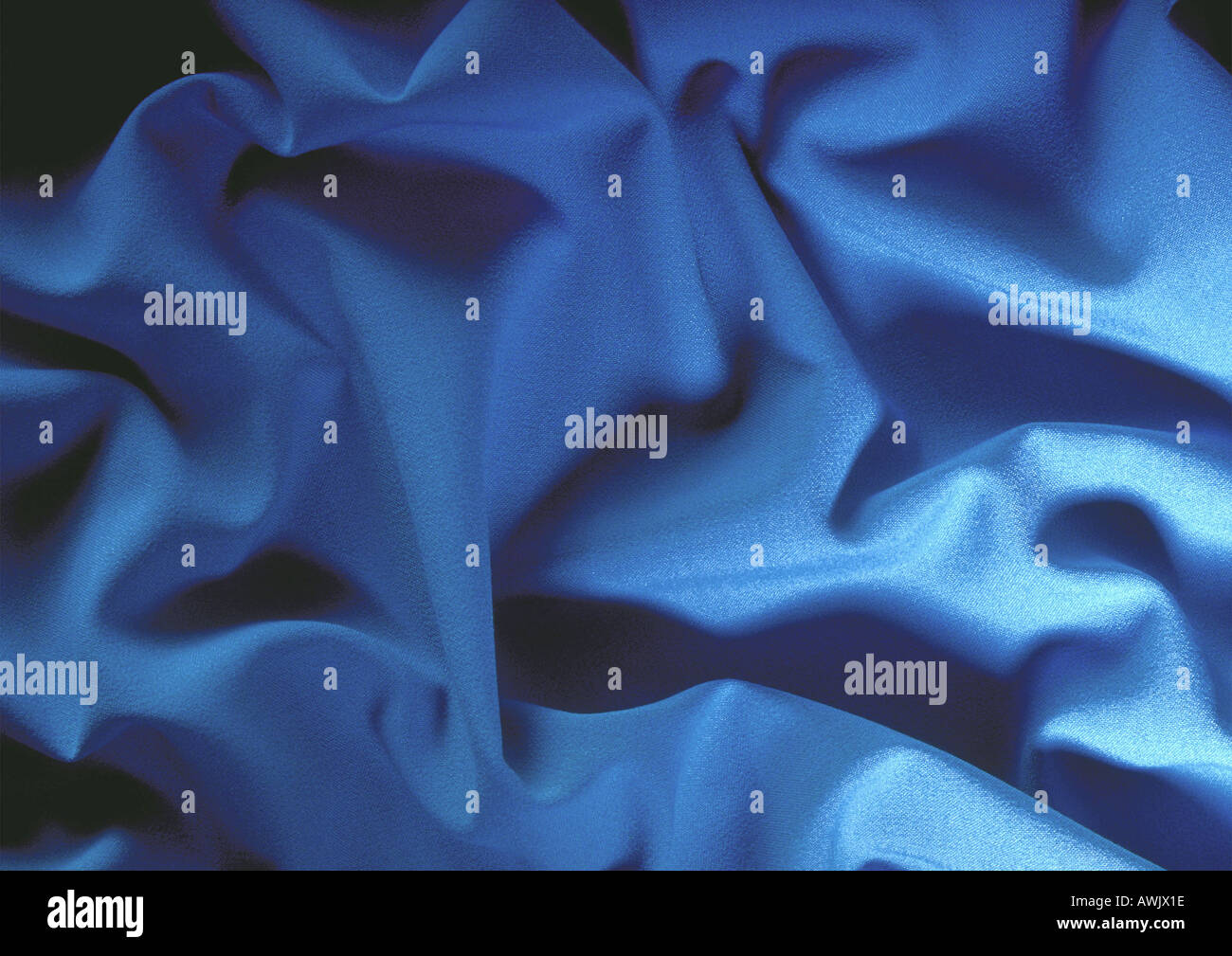 Blue draped fabric texture hi-res stock photography and images - Alamy