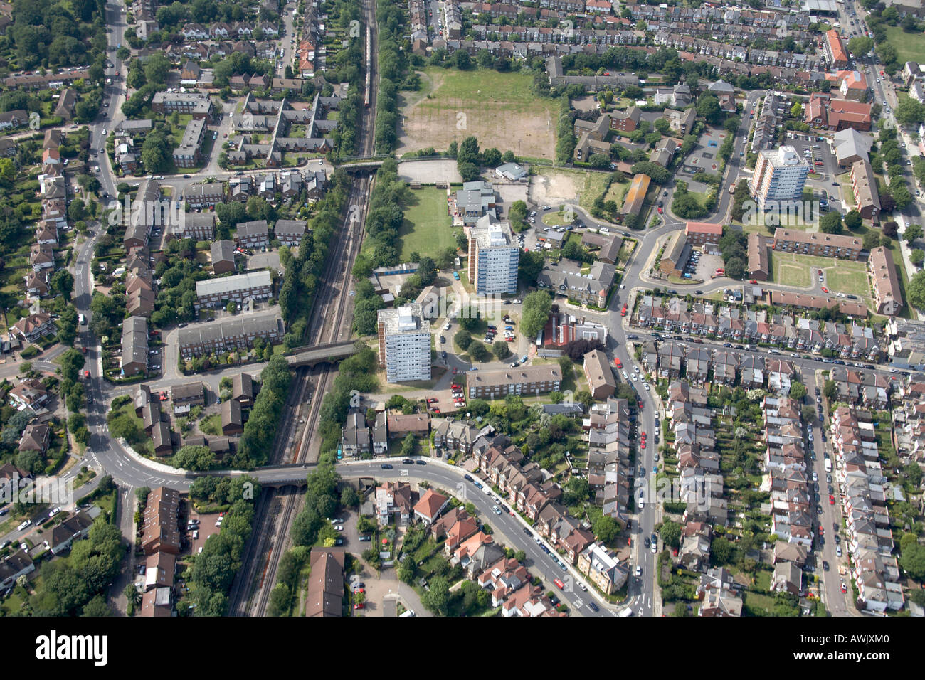 High level oblique aerial view north west Youth Centre Sports Ground Primary School Northern Line track East Finchley Barnet Stock Photo