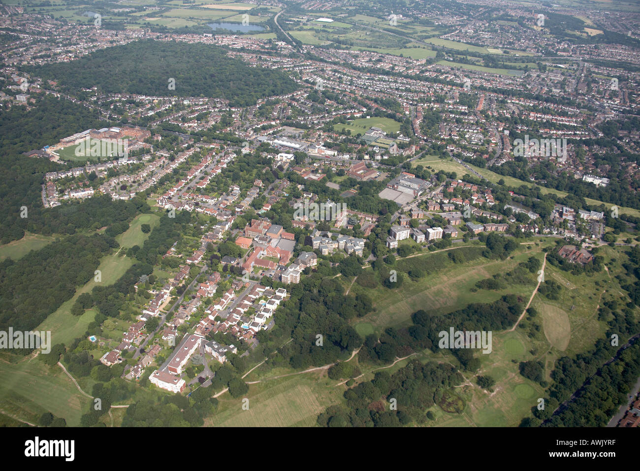 High level oblique aerial view southeast of Buckhurst Hill Lords Bushes Redbridge Reeds Forest Bancroft School Woodford Golfcour Stock Photo