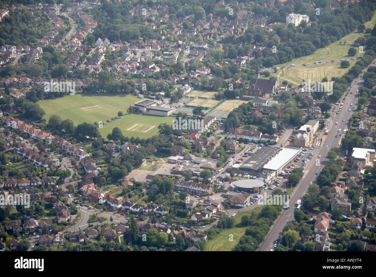 High level oblique aerial view southeast of Woodford Wells Club Cricket Ground Tennis Courts Horse and Well PH  London IG9 Stock Photo