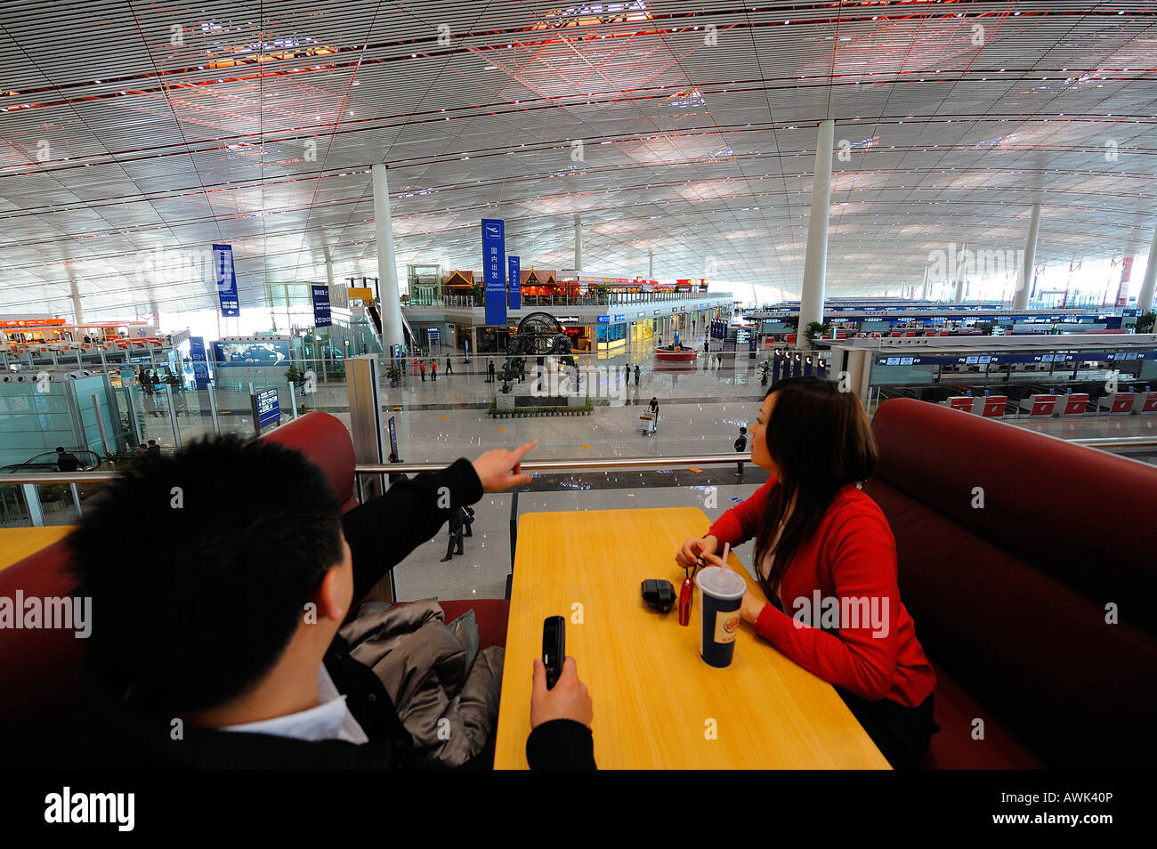 Passengers at a restaurant in Terminal 3 Beijing Capital Airport. 13-Mar-2008 Stock Photo