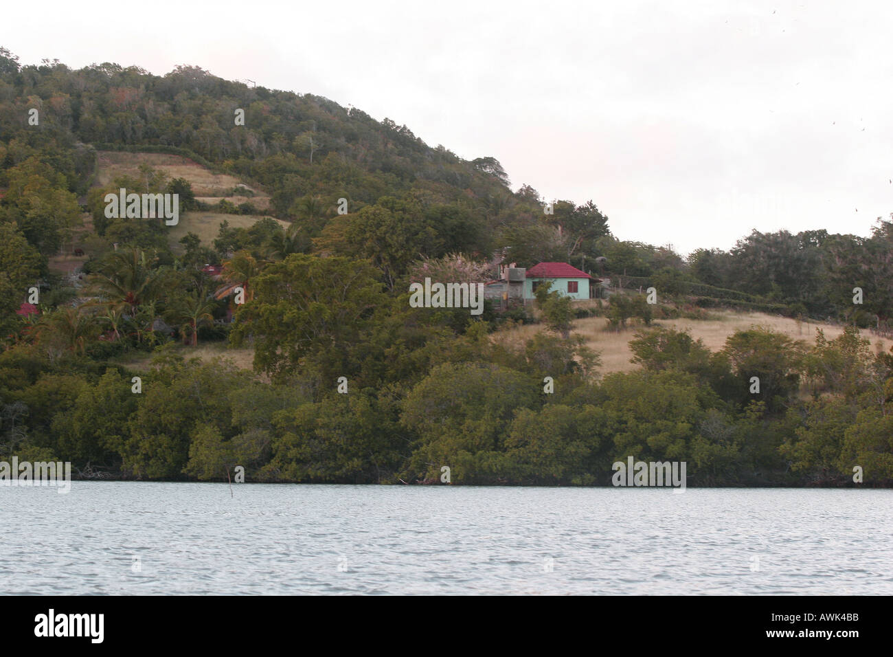 Cuban house by the river Holguin Stock Photo Alamy