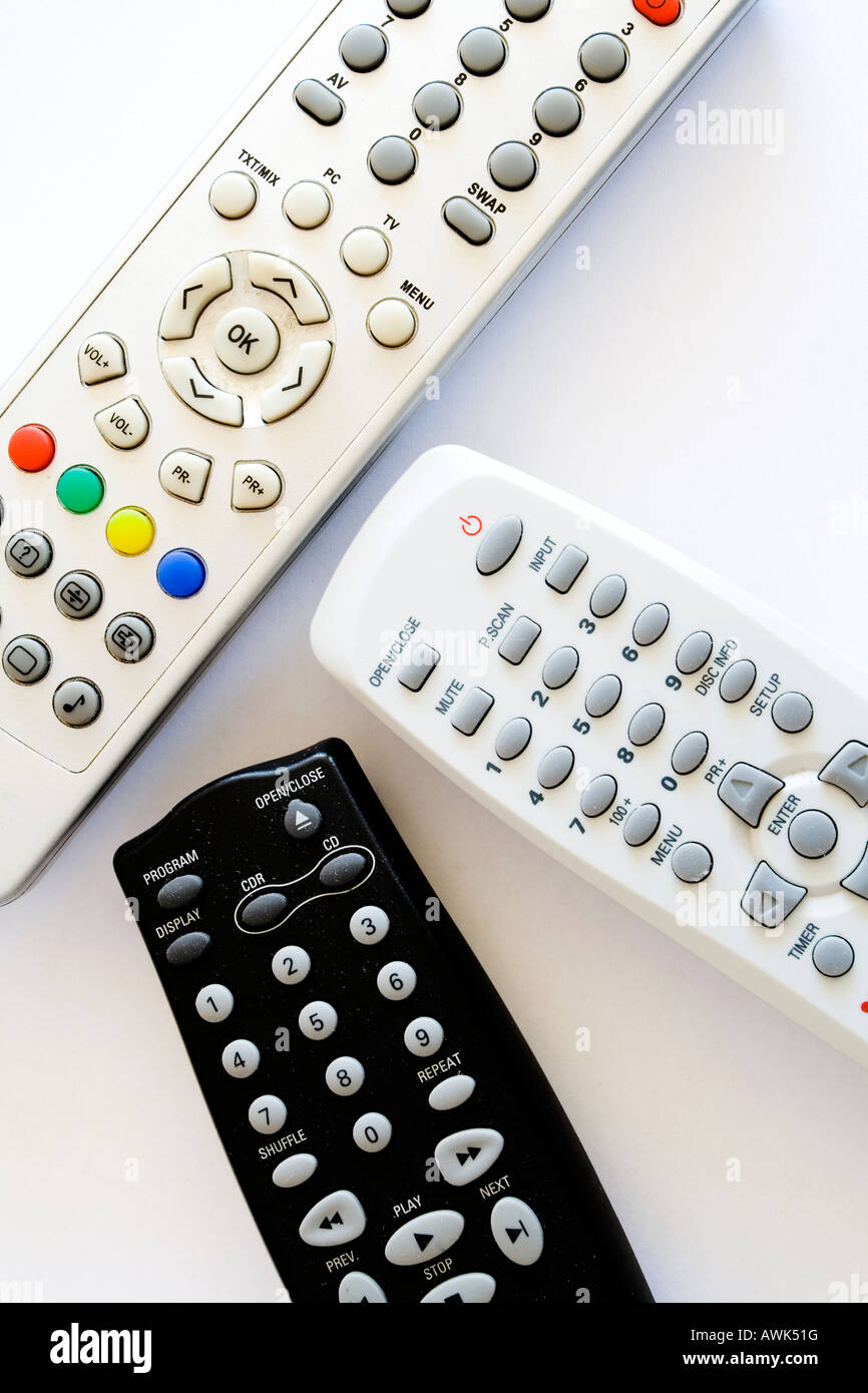 Close up view of remote controls for domestic DVD player recorder and television and cd player Stock Photo