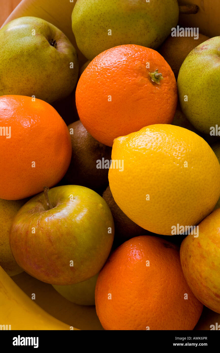Close up view of oranges apples lemon and pears in a fruit bowl Stock ...