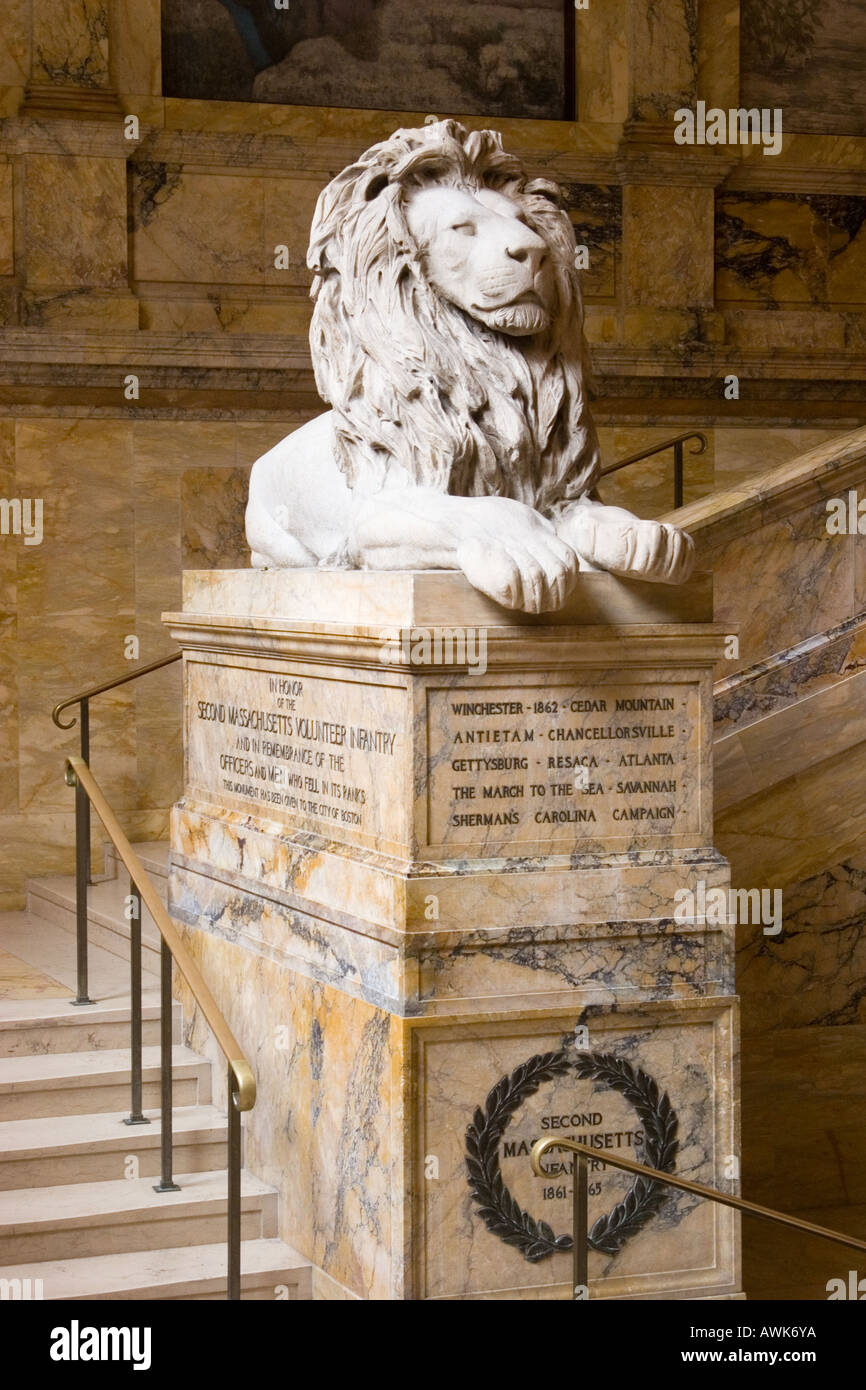 Stone lion statue on plinth commemmorating Massachusetts Volunteer Infantry   in Boston Public Library in Boston, Massachusetts, Stock Photo