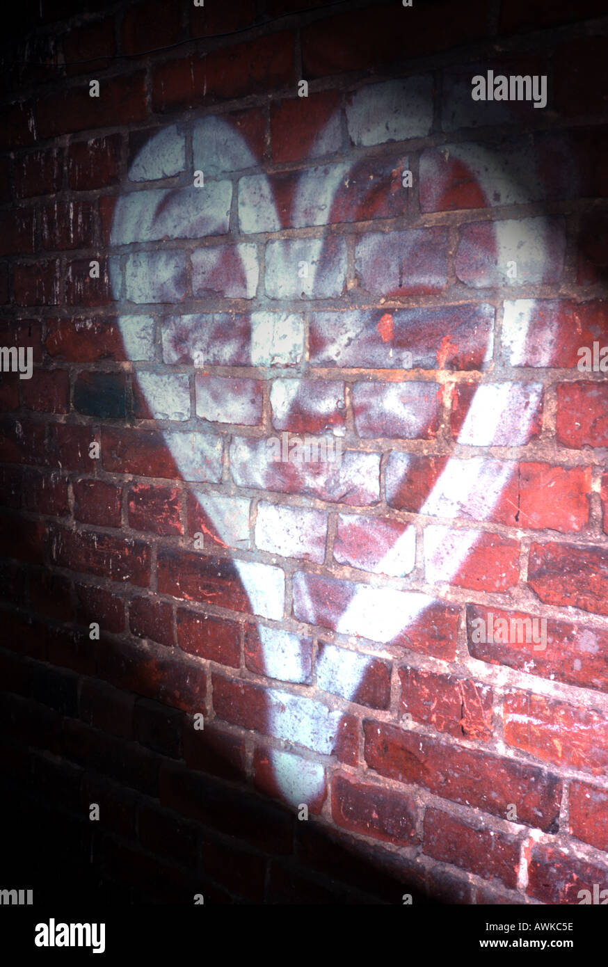 Heart graffiti painted on wall Stock Photo