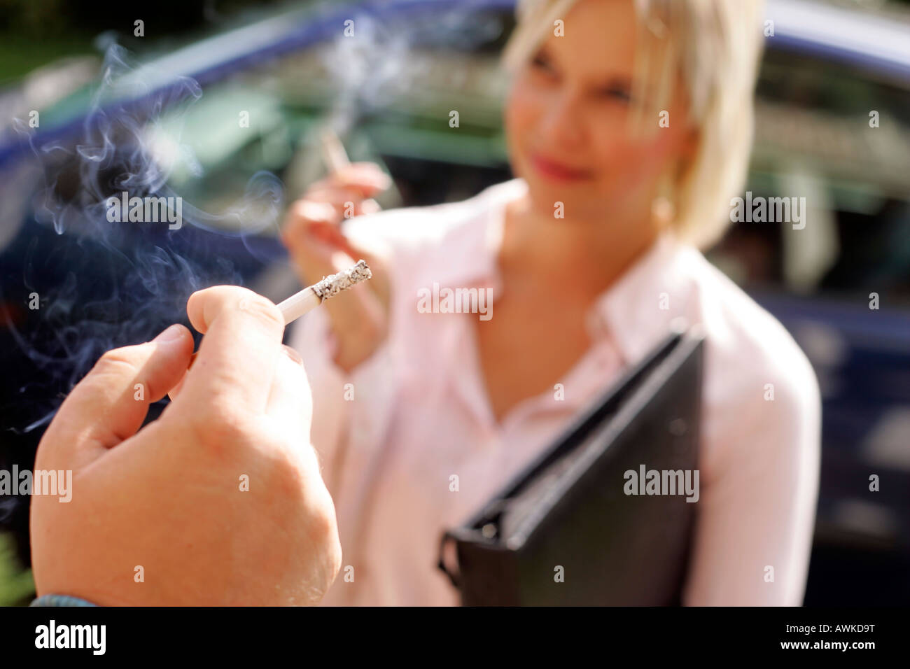 Workers smoking outside office hires stock photography and images Alamy