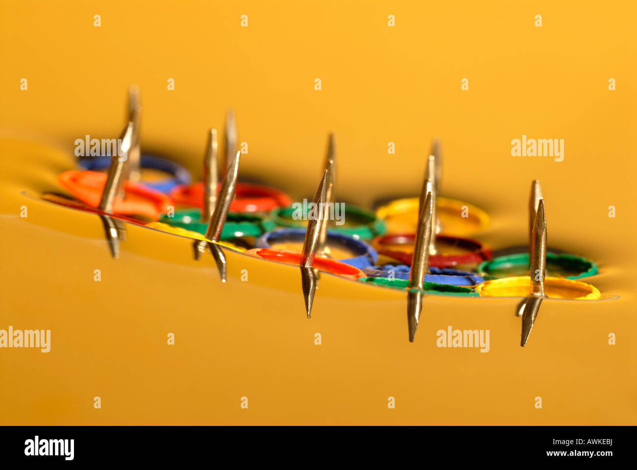 Pins tacks floating coloured red green blue yellow hires stock