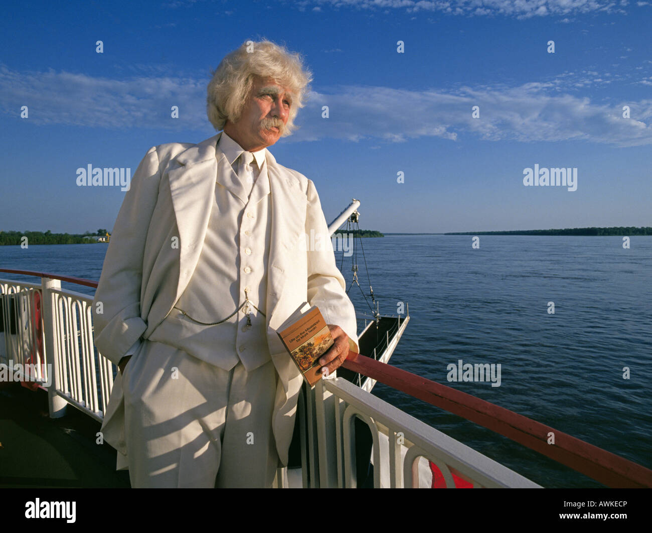 A portrait of Mark Twain or Samuel Clemens lookalike famous American writer and humorist and author of Tom Sawyer on the American Queen Steamboat. Stock Photo