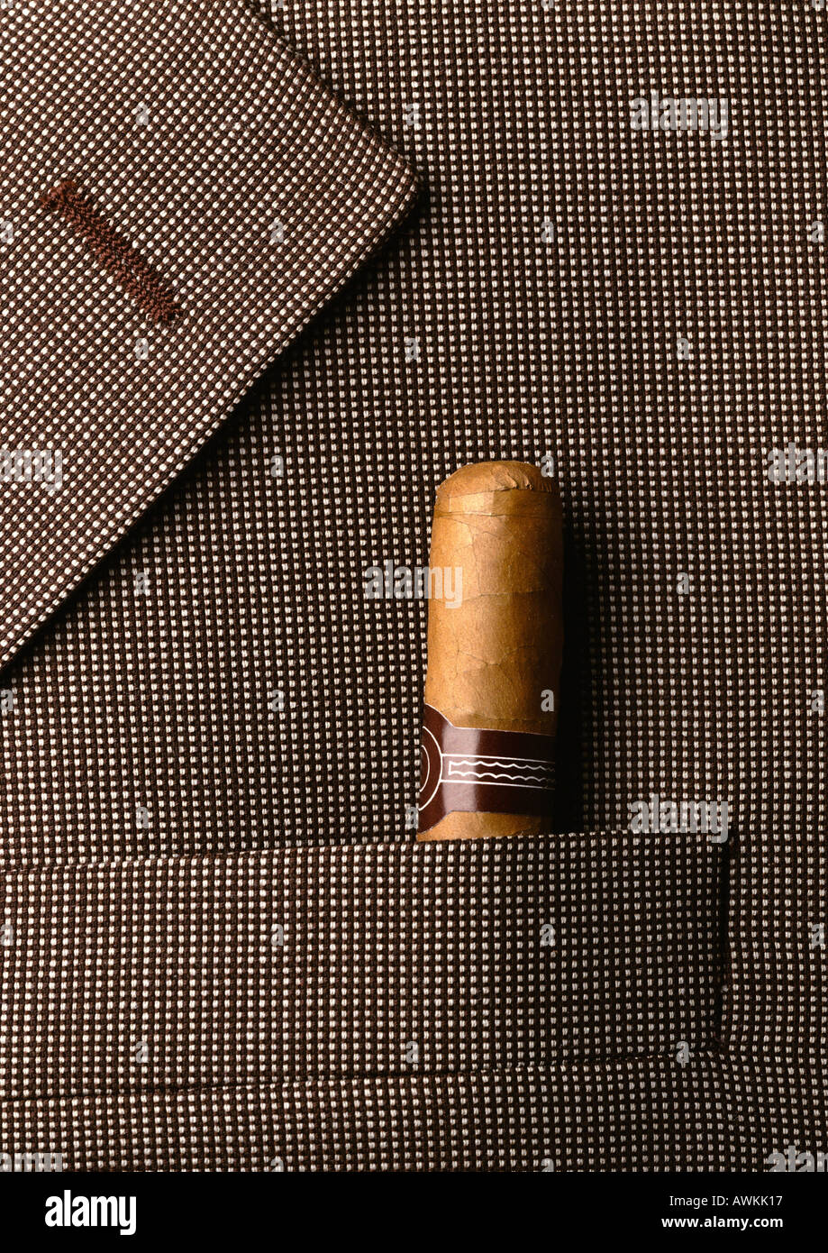 Man's jacket lapel with cigar in pocket Stock Photo