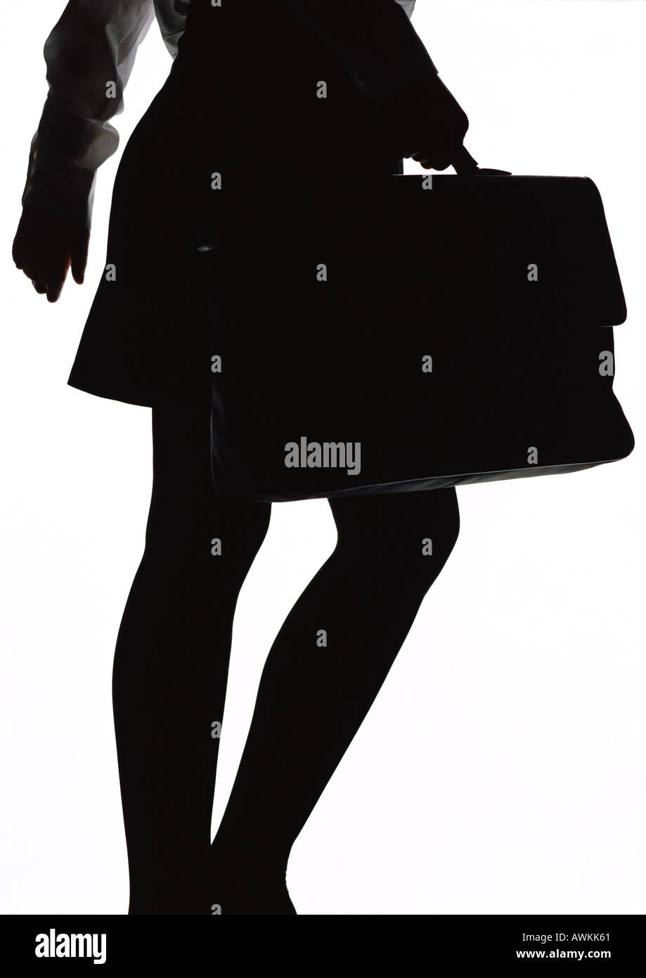 Woman walking with briefcase, silhouette Stock Photo Alamy