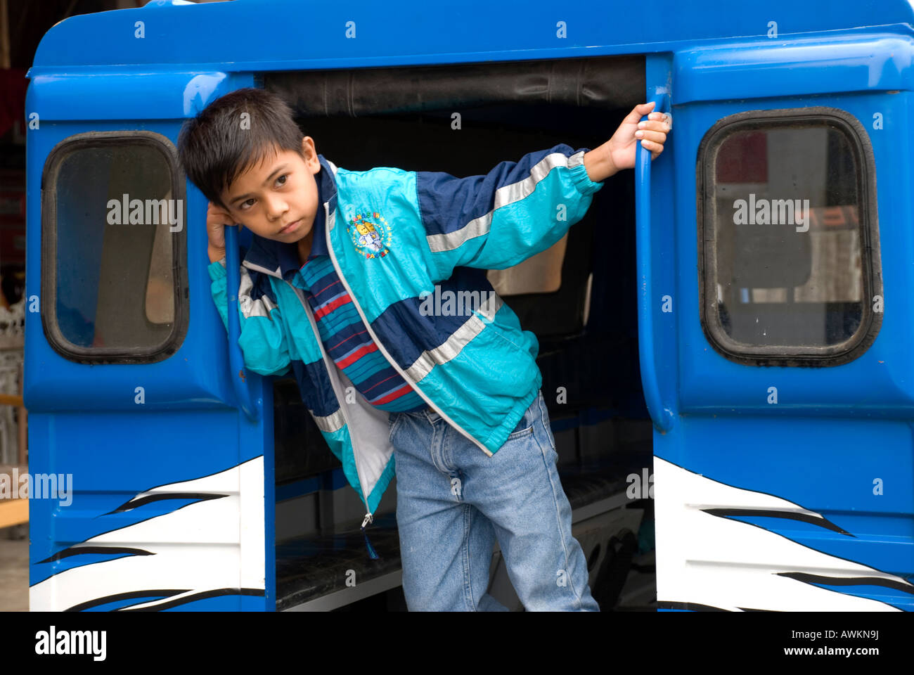 philippines island siquijor town boy in jeepney Stock Photo