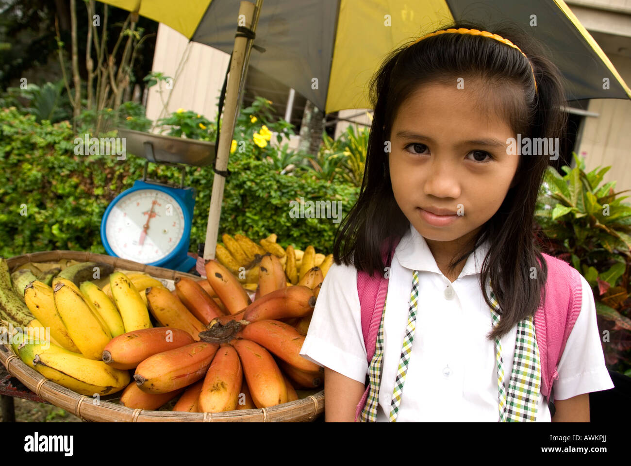 philippines siquijor island larena town girl with fruit stall Stock Photo