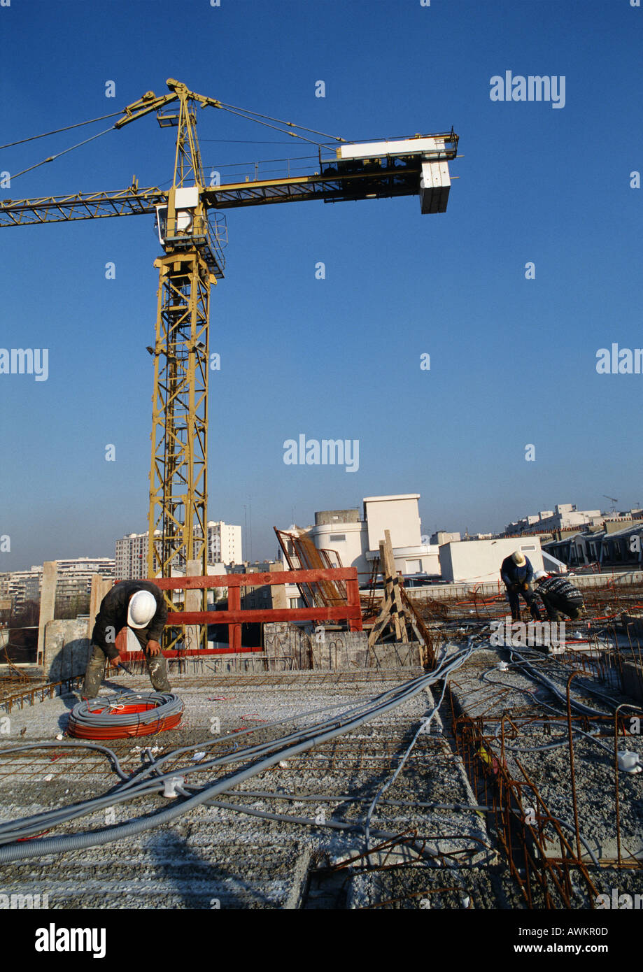 Workers at construction site Stock Photo - Alamy