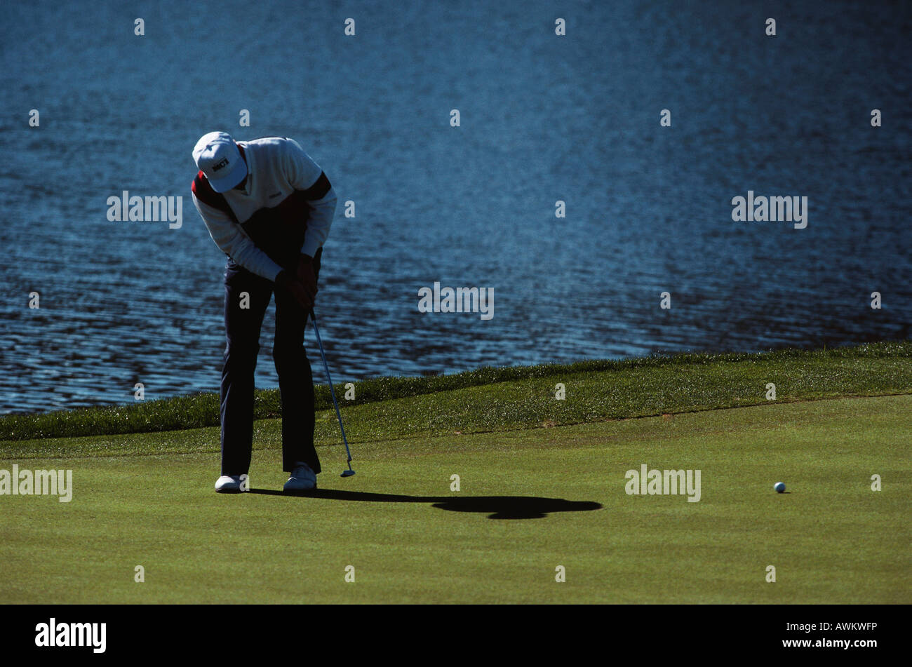 Golfer putting Stock Photo