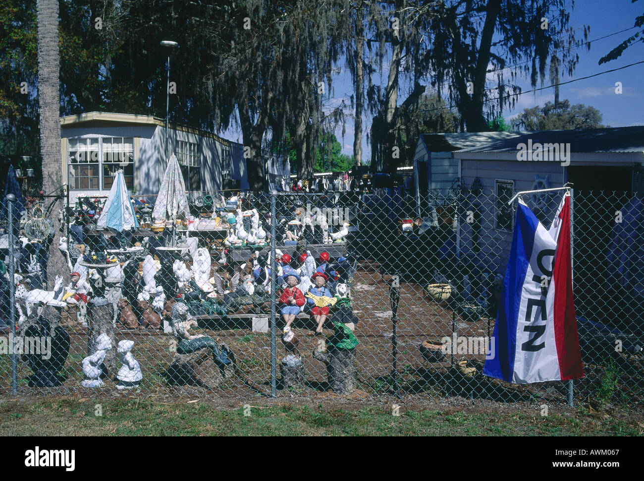 Junkyard sale behind chainlink fence, Okeechobee, Florida, USA Stock