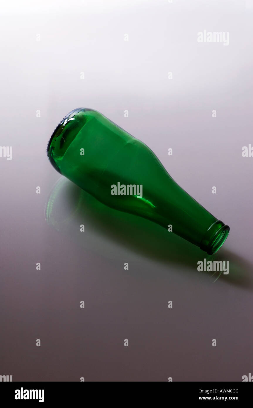 Discarded empty green glass bottle Stock Photo Alamy