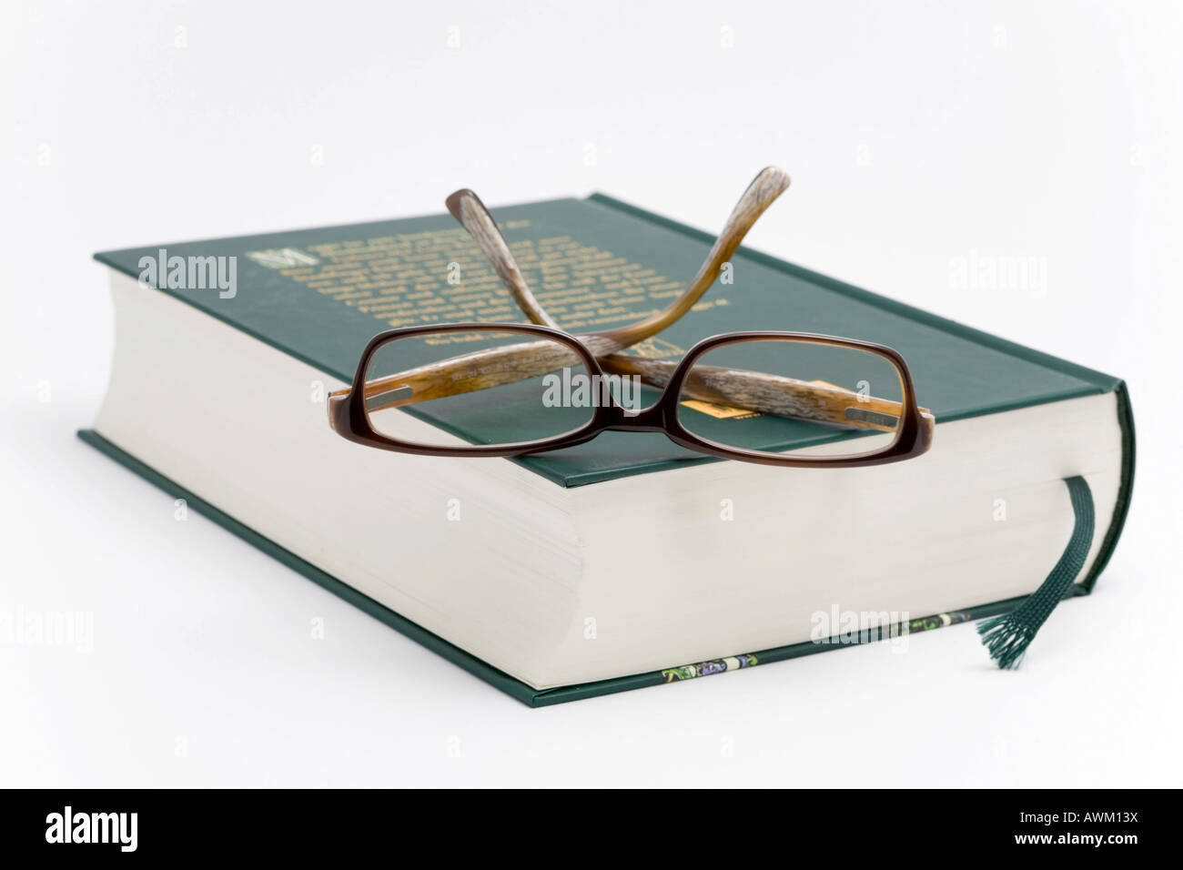 Reading glasses on a book Stock Photo
